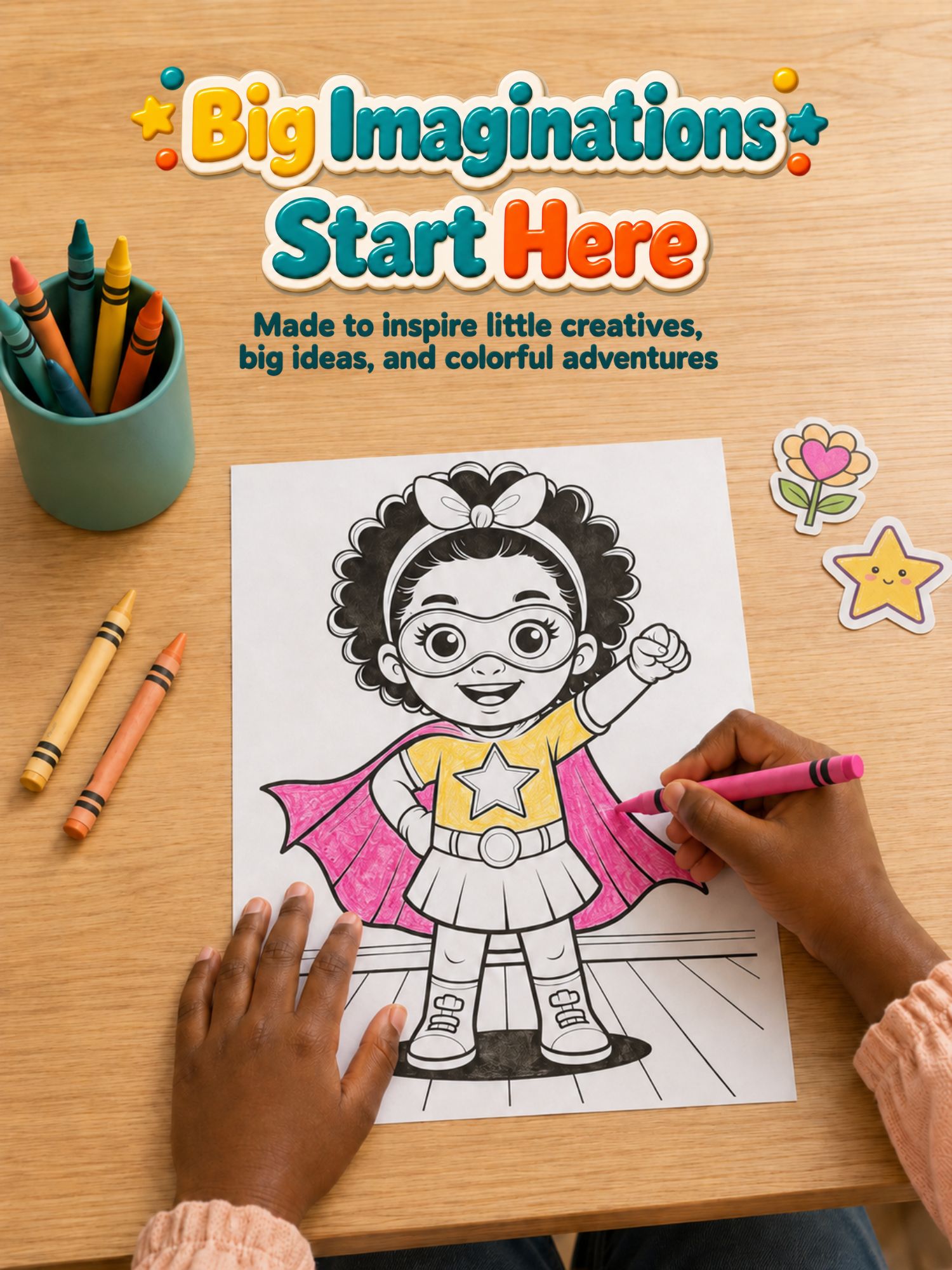 A child's hands are shown coloring a cartoon girl on a coloring page with a pink crayon, set on a wooden desk with crayons and stickers. The top of the image features a banner reading 'Big Imaginations Start Here'.