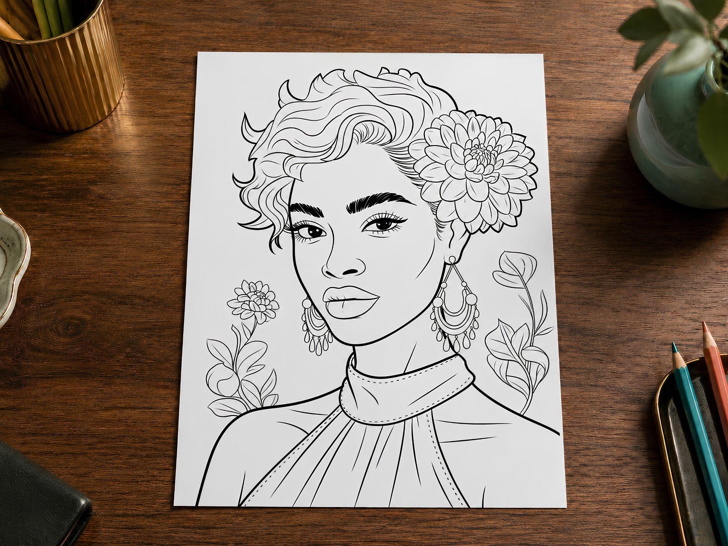 Black and white line drawing of a woman with flowers on a wooden surface with coloring pencils.
